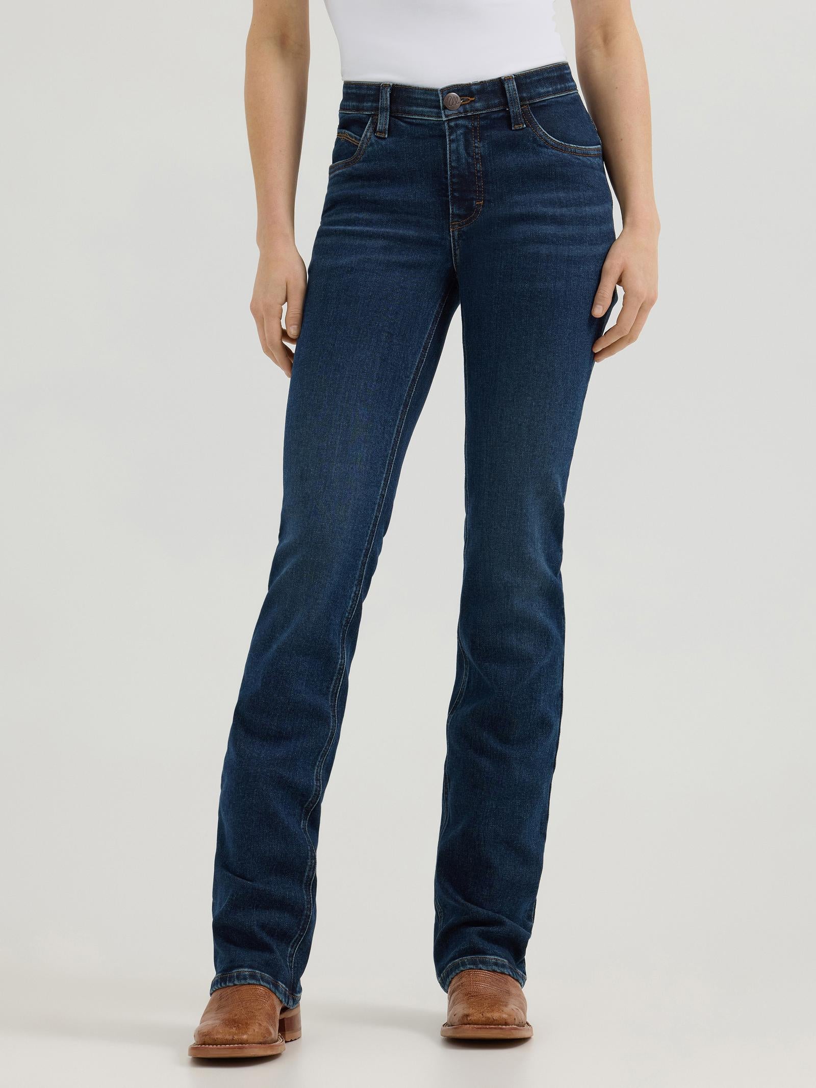 Wrangler Women's Willow Ultimate Riding Jean in Traci wash, showing the mid-rise waist and bootcut leg 