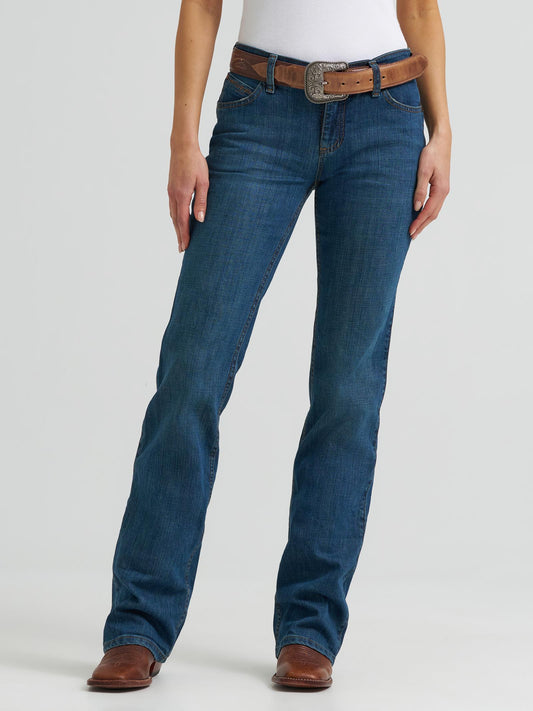 Front view of Wrangler womens Q-Baby Ultimate Riding Jean in TB wash, featuring a mid-rise fit and bootcut leg on a white background 