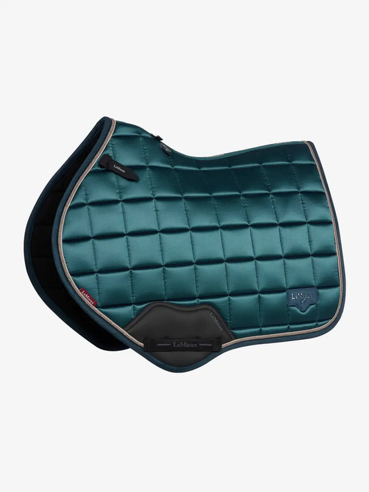 LeMieux Loire Close Contact Saddle Pad in Jungle featuring a deep forest green satin finish and signature metal logo.

